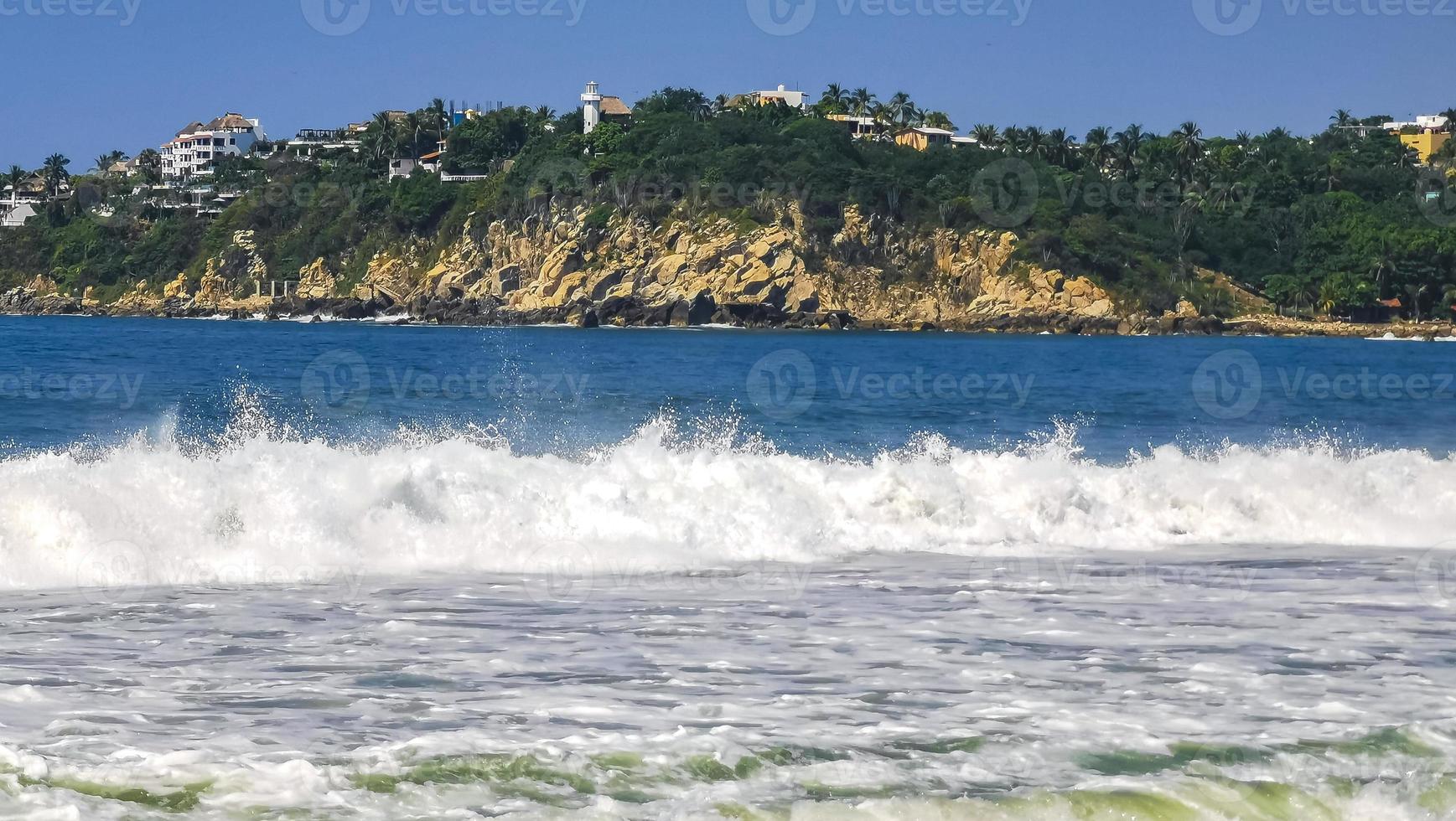 Extremely huge big surfer waves at beach Puerto Escondido Mexico. photo