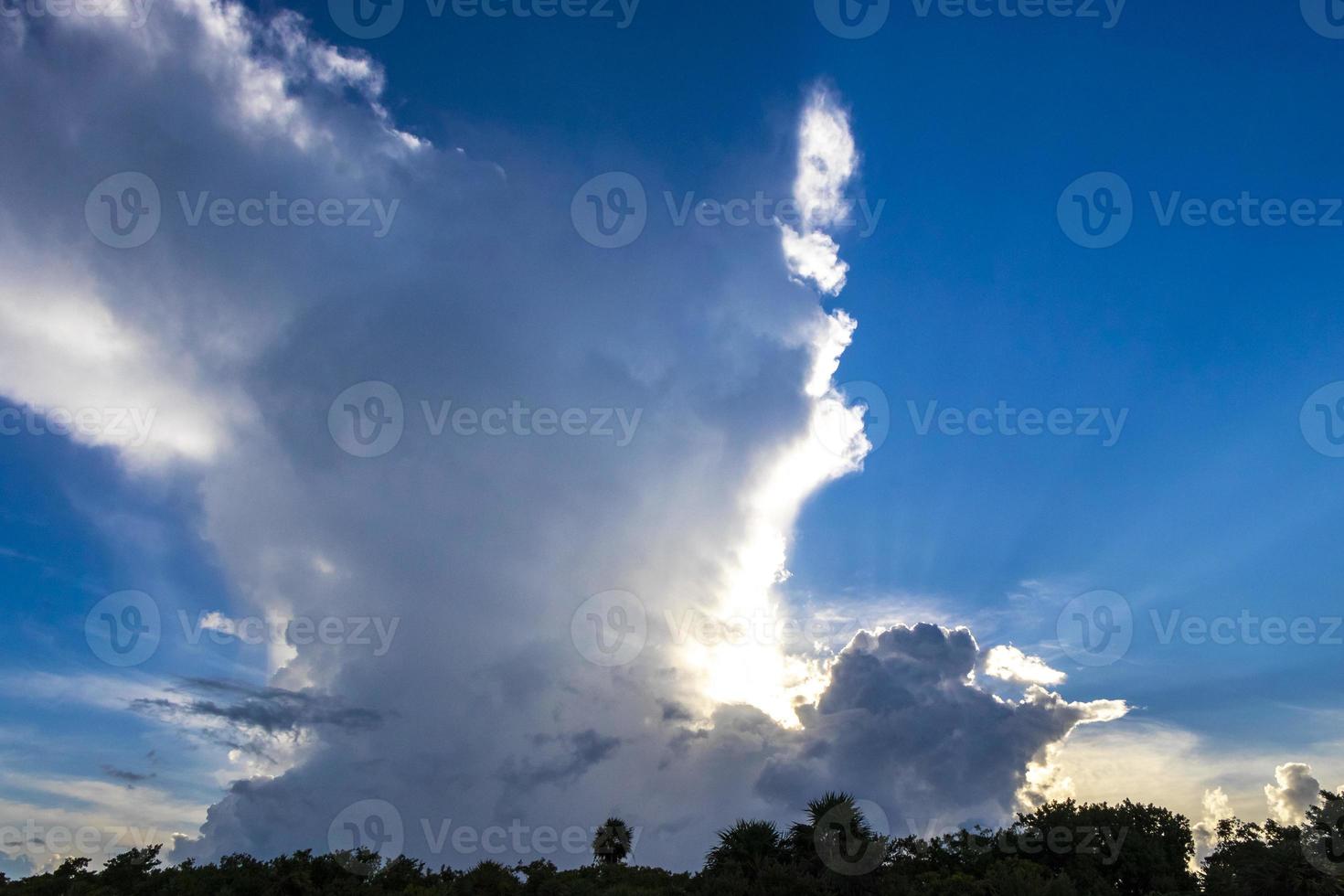 Explosive cloud formation cumulus clouds in the sky in Mexico. photo