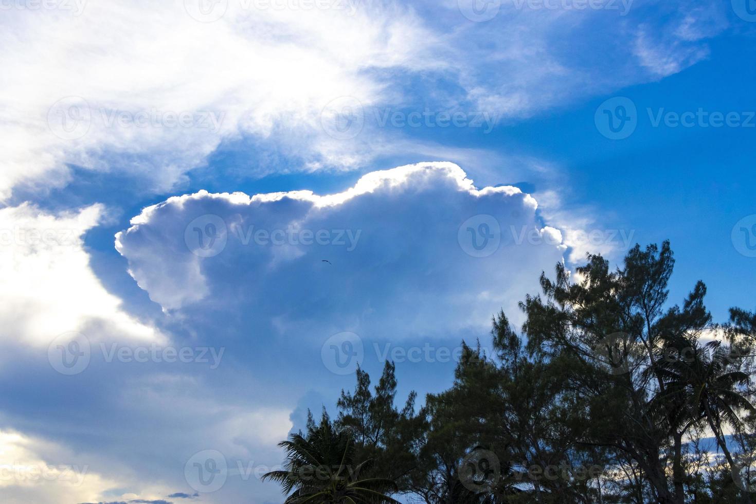 Explosive cloud formation cumulus clouds in the sky in Mexico. photo