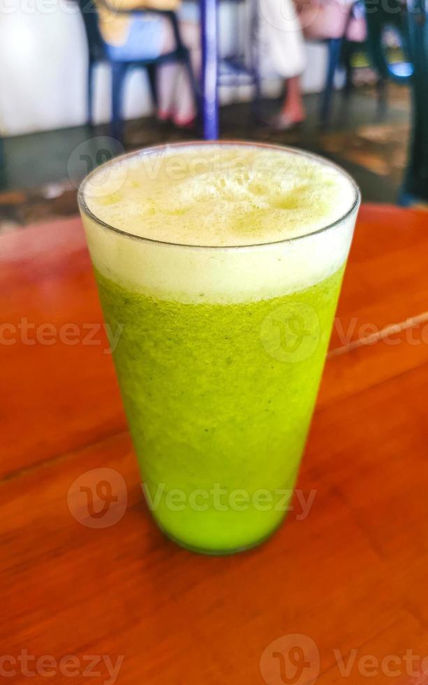Green healthy juice smoothie in jar in Puerto Escondido Mexico. 16788180 Stock Photo at Vecteezy