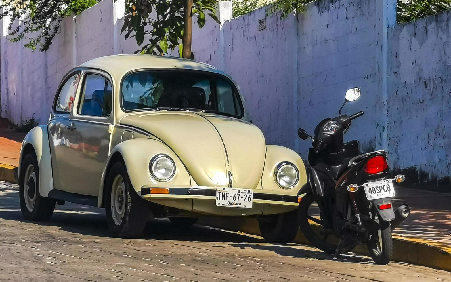 Puerto Escondido Oaxaca Mexico 2022 Various colorful tuned cars and classic vintage cars  Mexico. photo