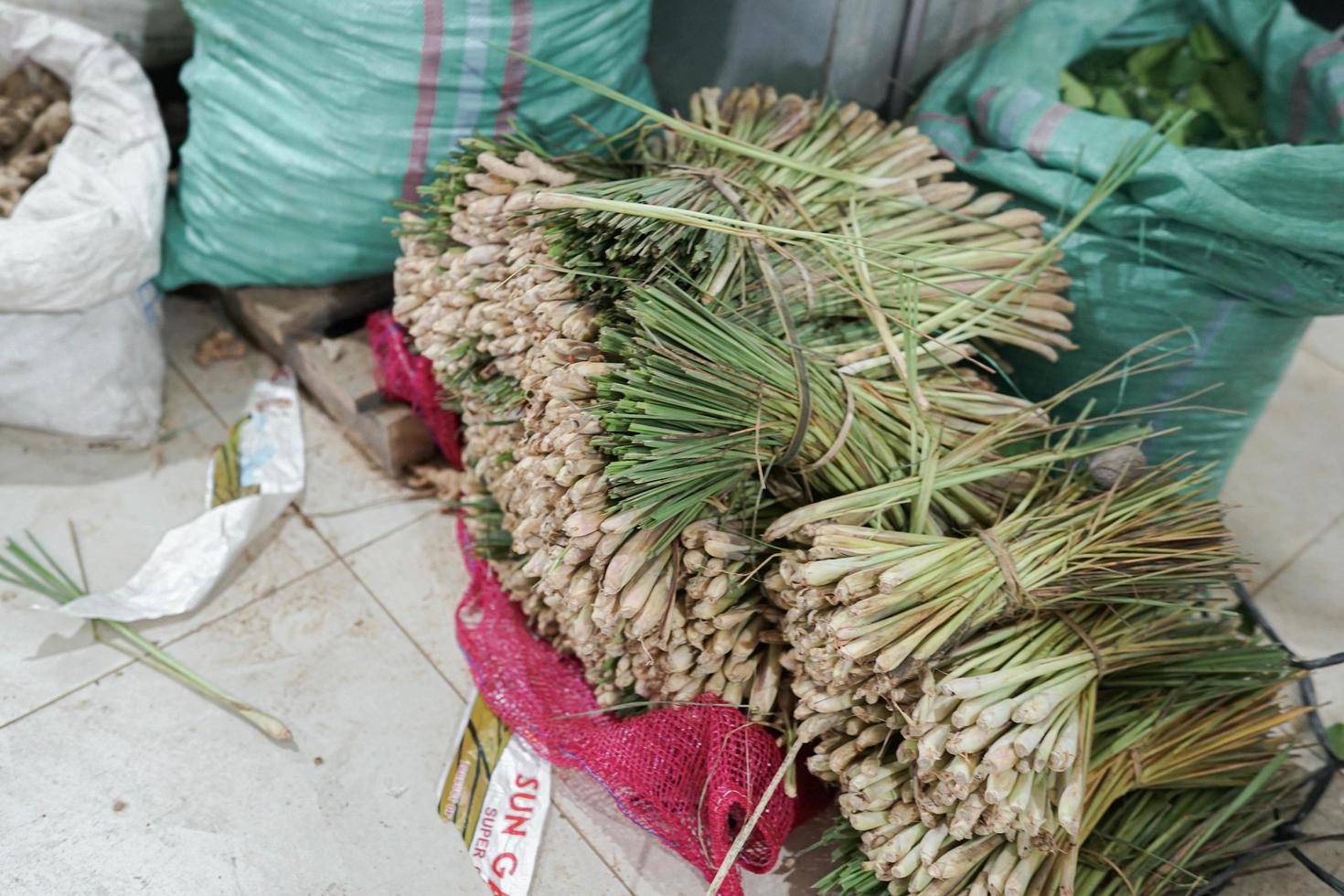 Fresh lemongrass tied in a traditional market photo
