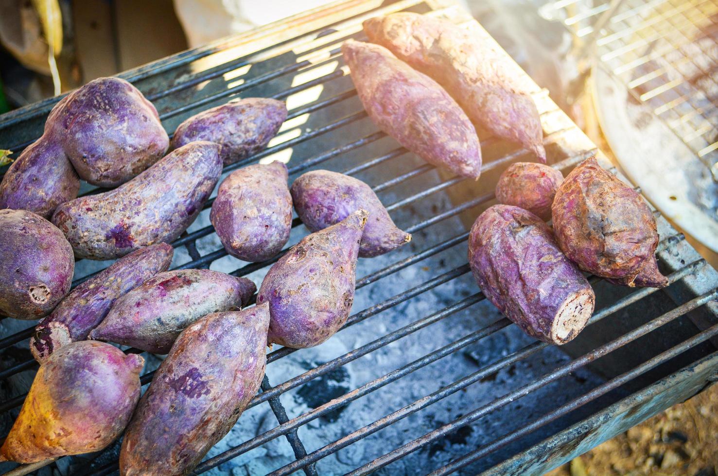 Grilled purple yam - sweet potato on grill photo