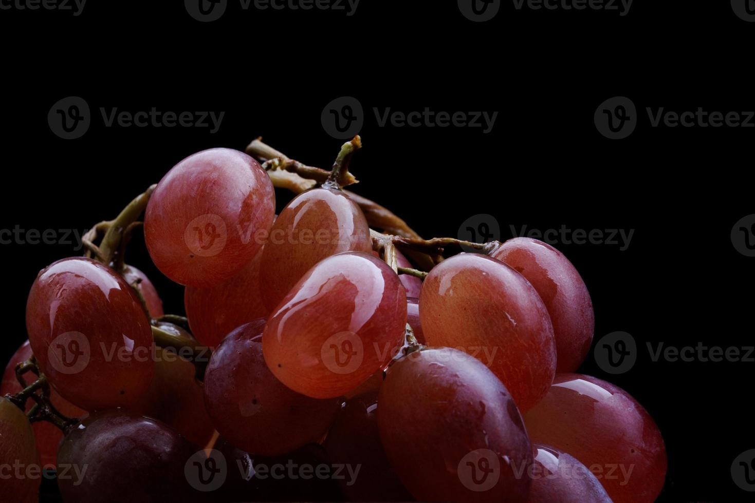 Bunch of ripe red grapes close up. photo