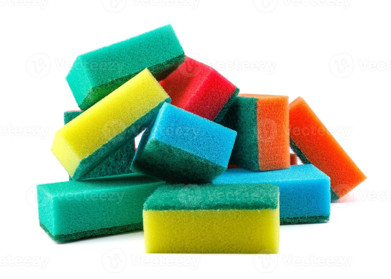 Several multi-colored sponges isolated on a white background. Sponge for washing dishes . photo