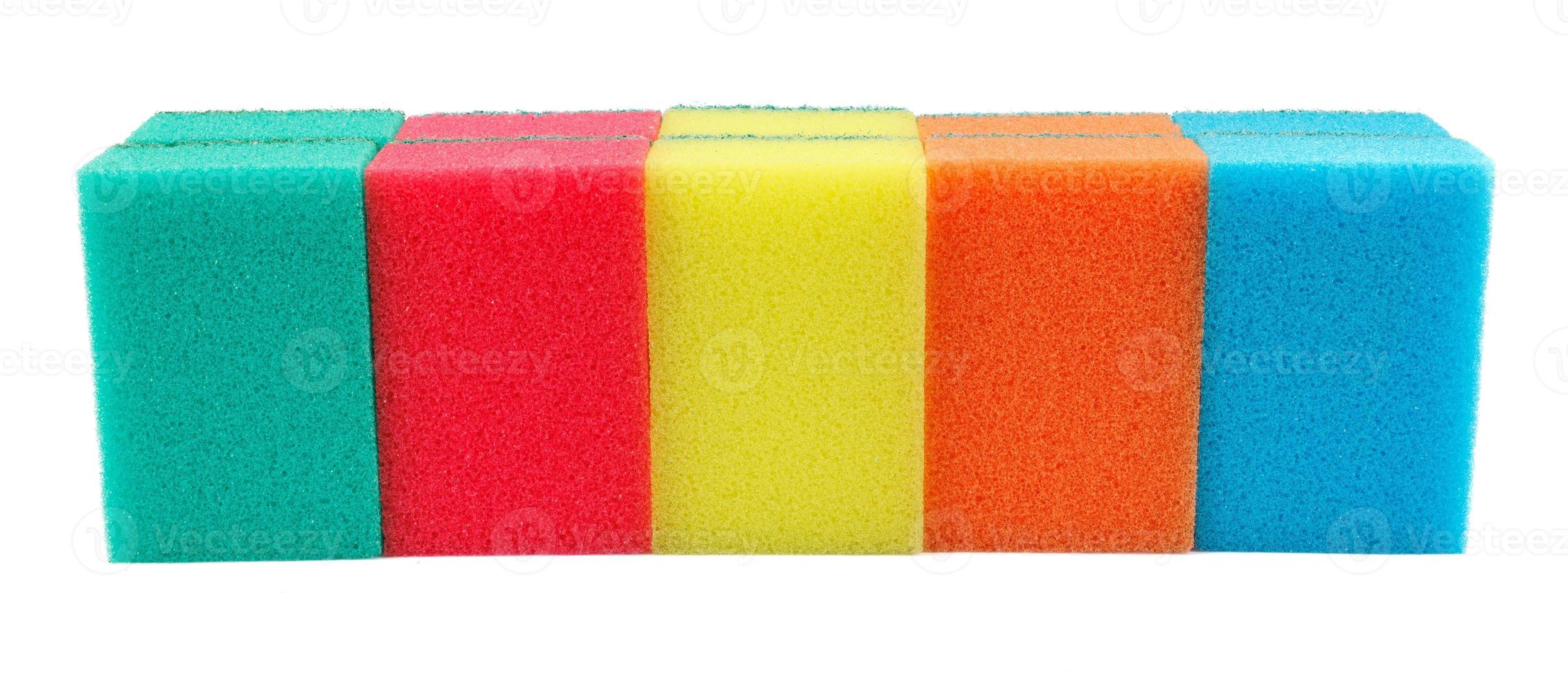 Several multi-colored sponges isolated on a white background. Sponge for washing dishes . photo