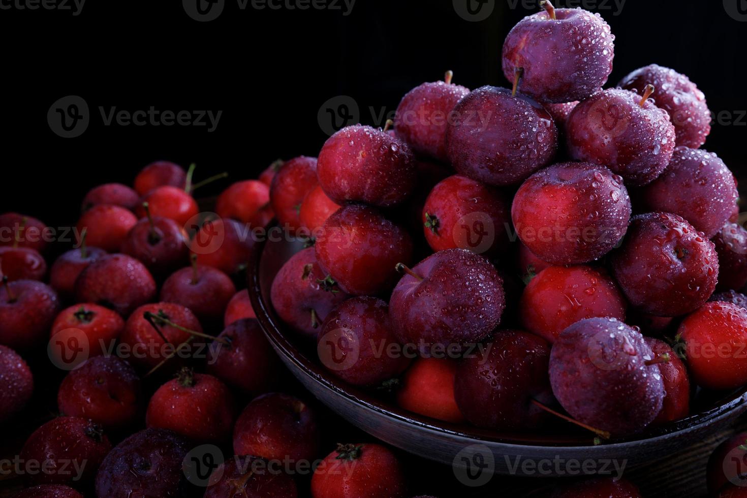 Full plate of fresh red apples. Mountain of ripe apples. photo