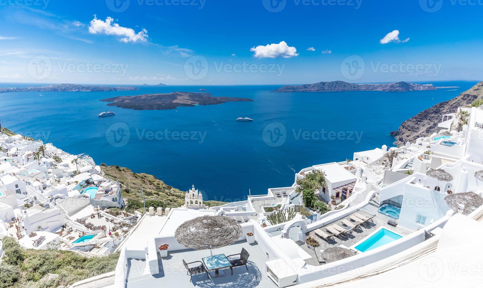 White architecture on Santorini island, Greece. Beautiful summer landscape panorama and sea view, luxury hotel or resort. Romantic couples travel destination idyllic streets photo