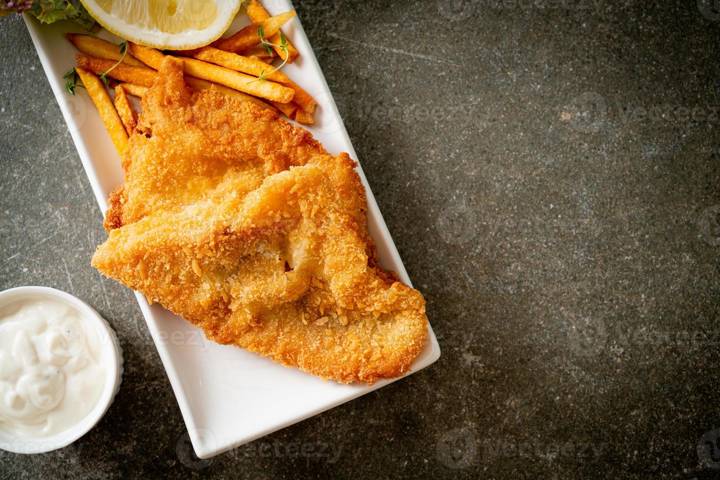 fish and chips - fried fish fillet with potatoes chips photo