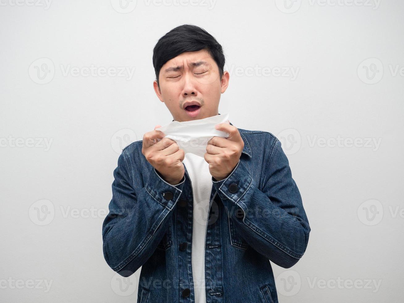 Sickness man jeans shirt cough in tissue paper,sickness asian man photo