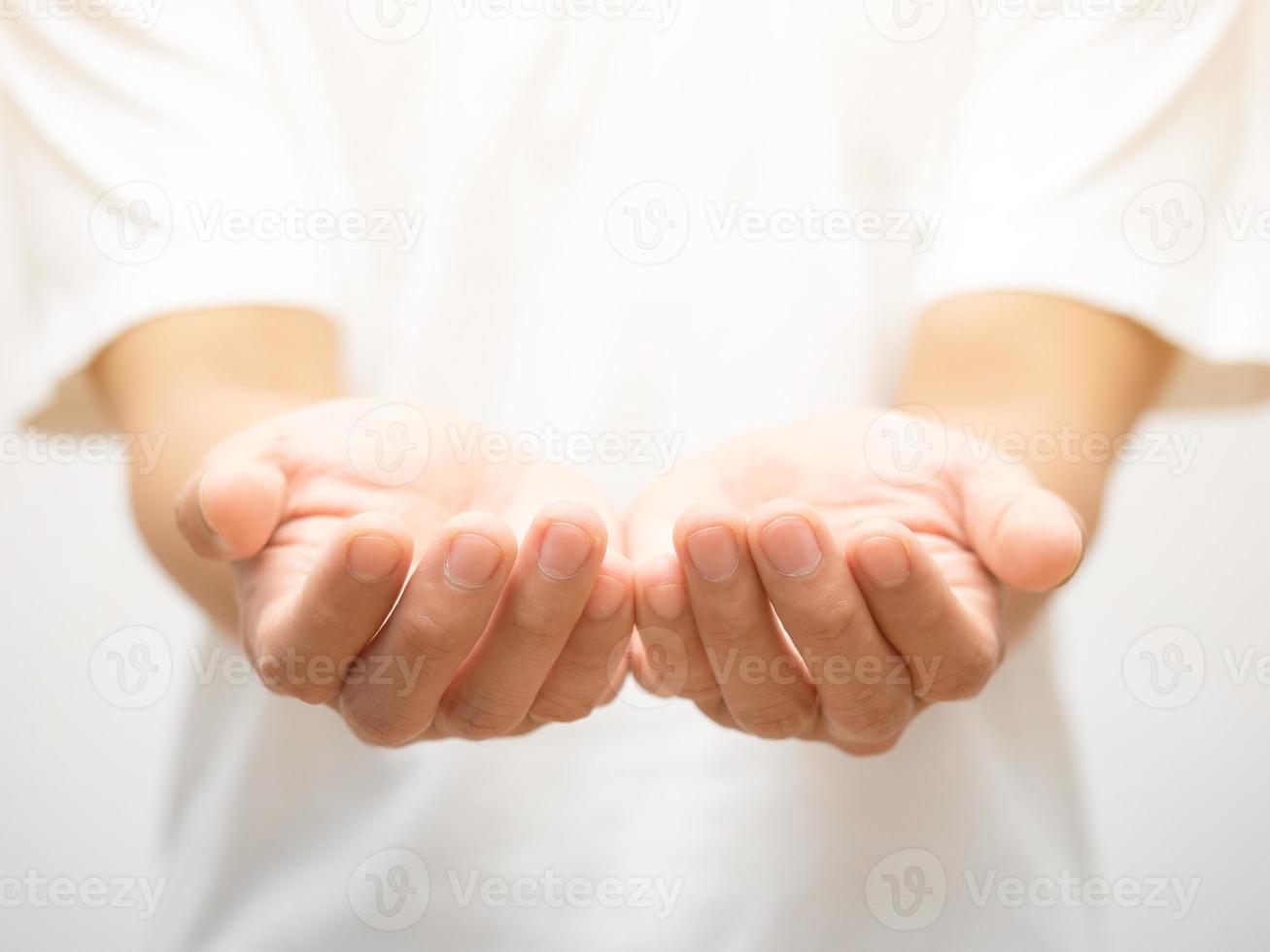 Closeup man hands skin focus finger giving hope photo