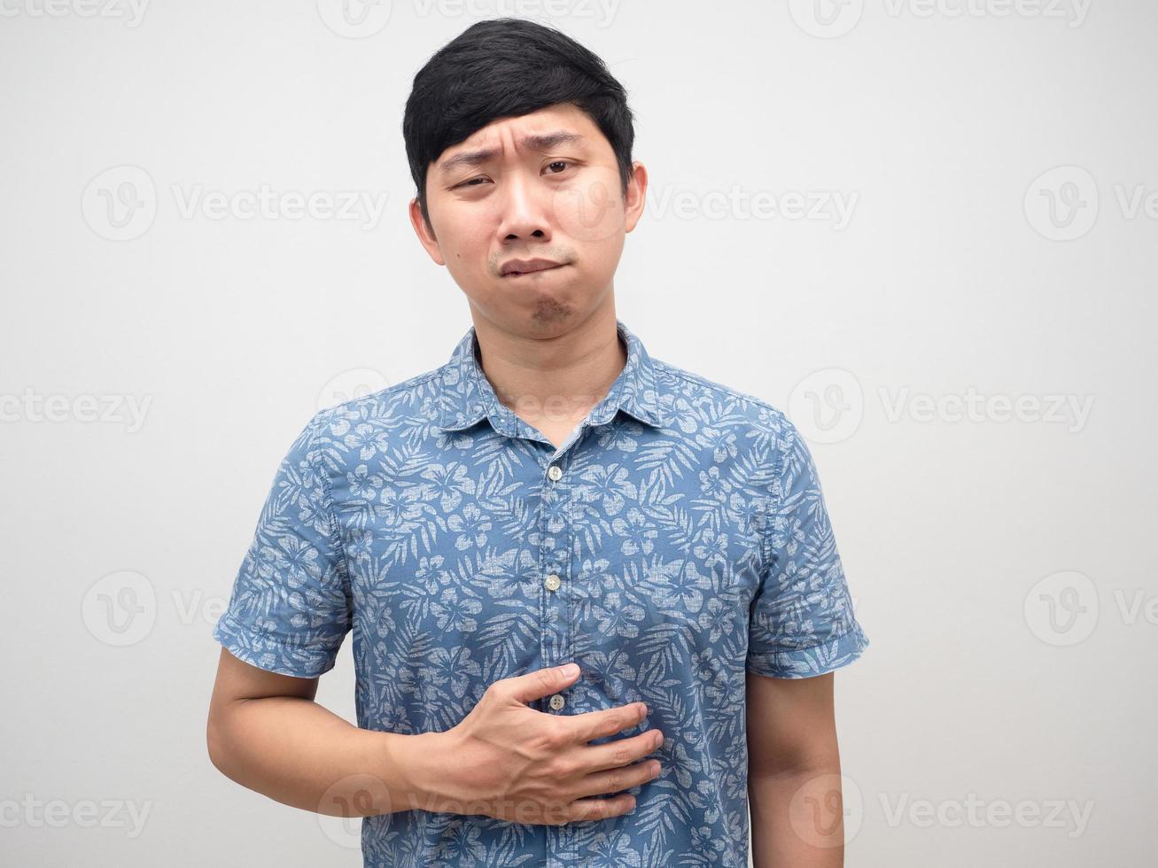 Asian man blue shirt hungry food gesture gritted teeth to eat photo