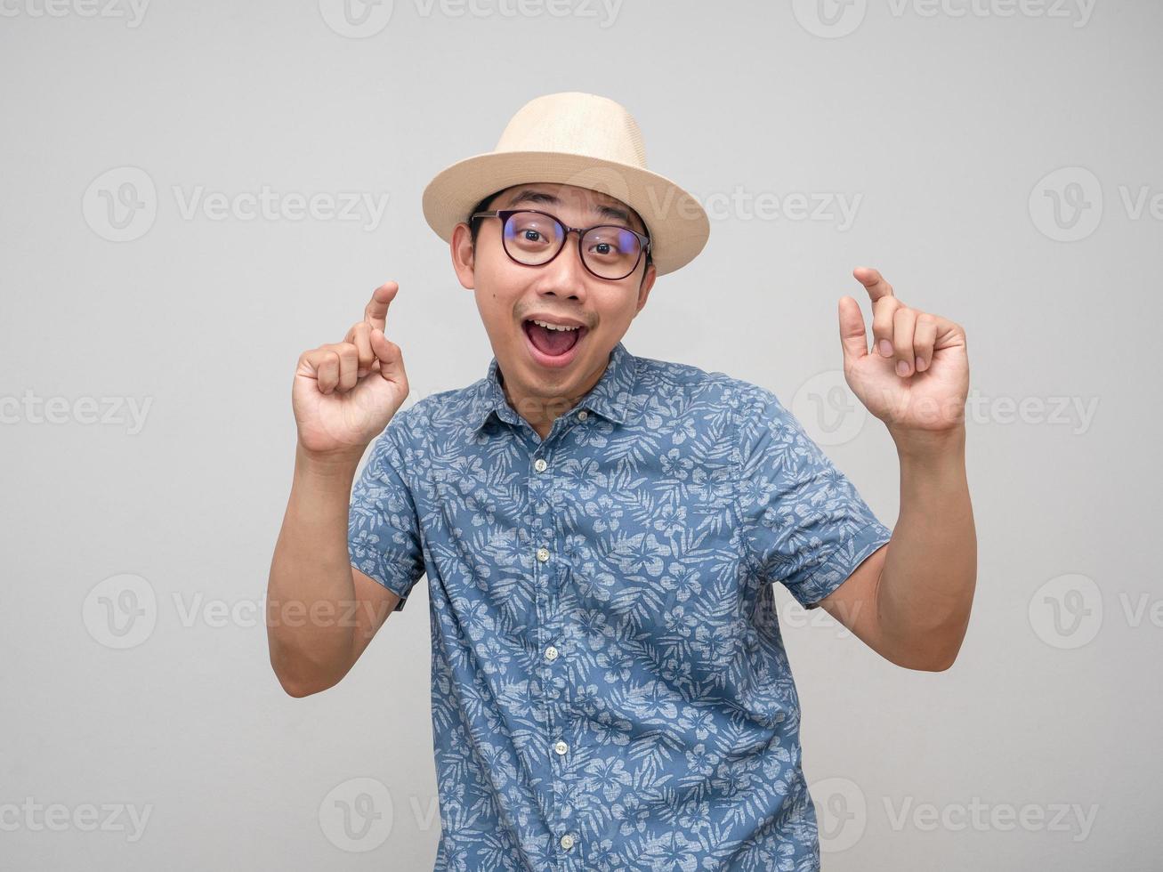 Asian man travler happy with holiday funny dance photo