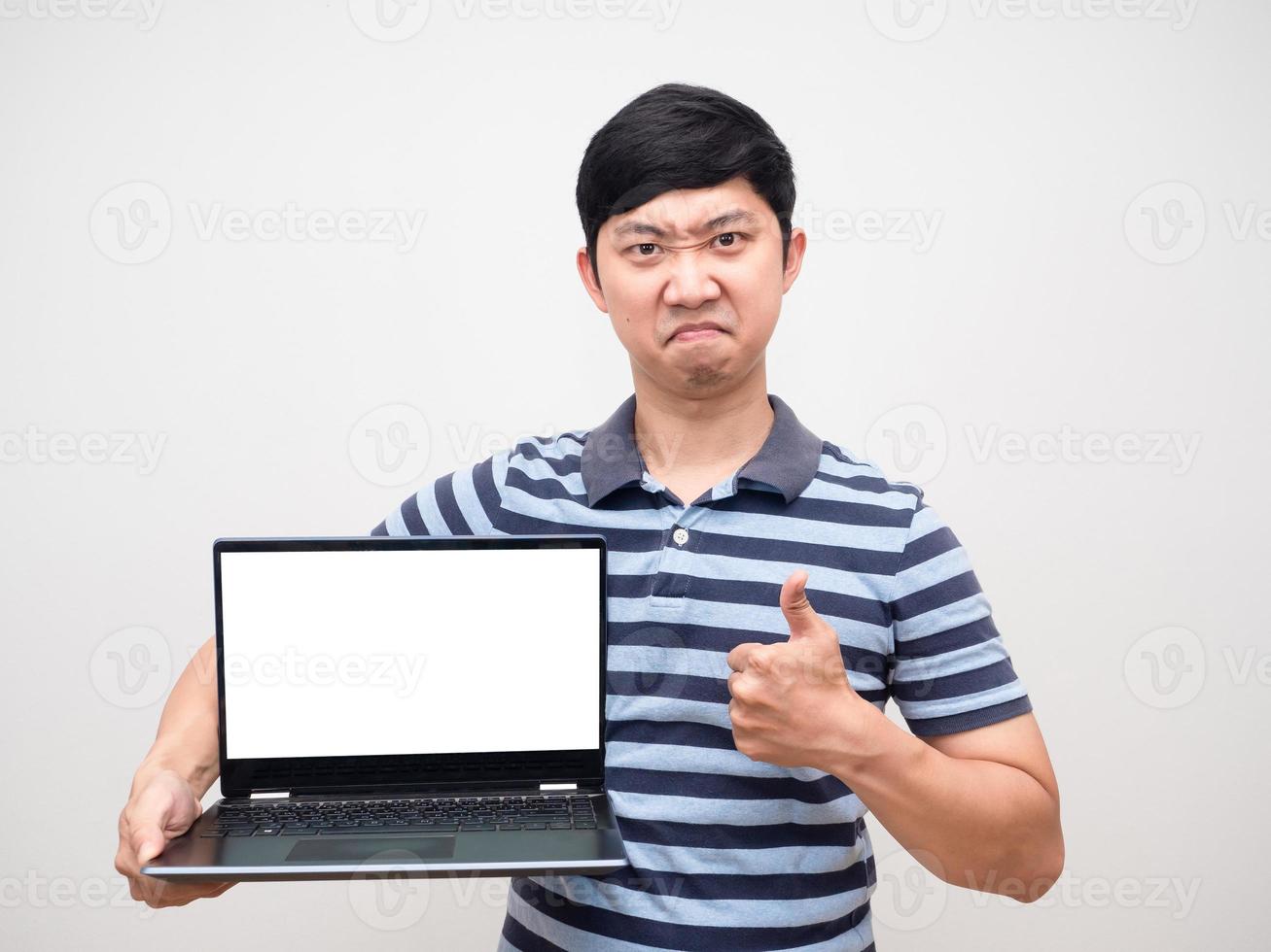 Young man striped shirt confident face holding laptop white screen and thumb up photo