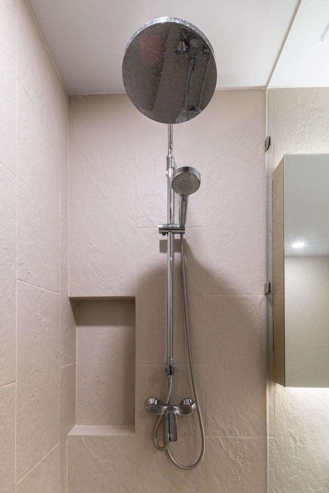 Loft white tile bathroom corner, tub and sink photo