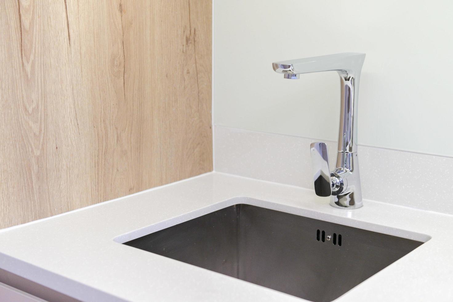 stainless steel kitchen sink in room photo