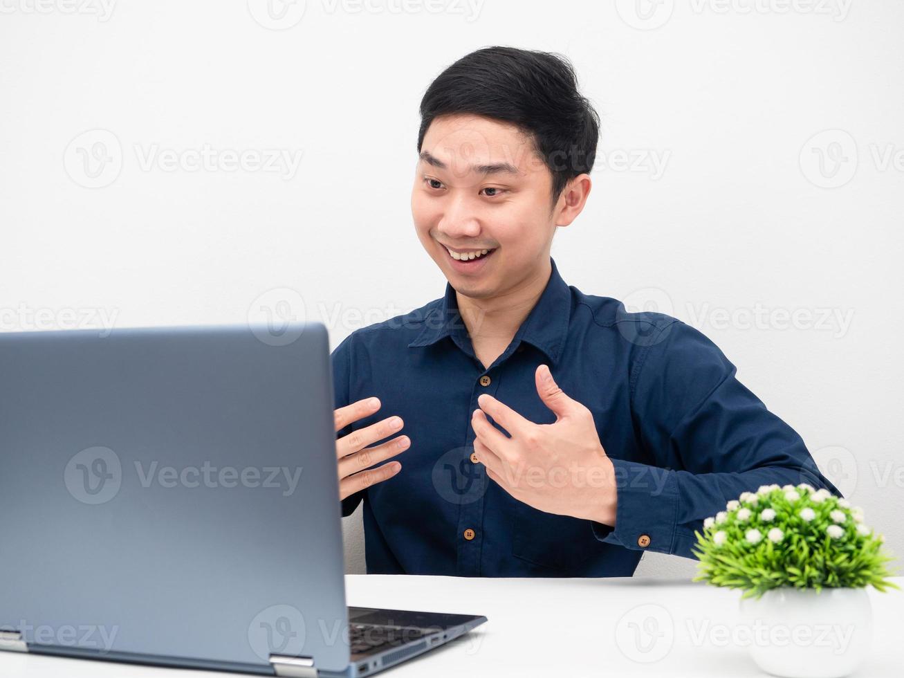 Man explain his work online with laptop on the table white background photo