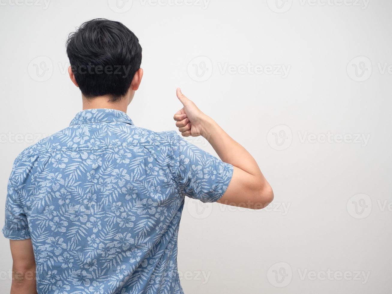 Man stand turn back thumb up copy space isolated photo