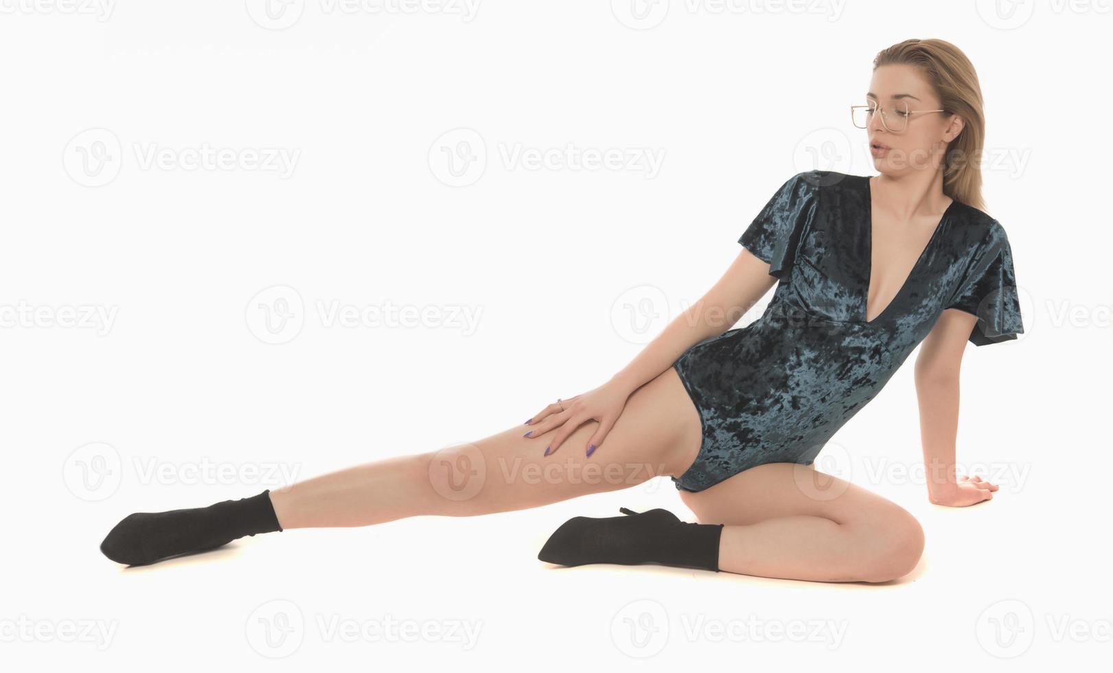 Beauty stylish woman posing in fashionable clothes in studio. Casual style, beauty accessories. High fashion urban style photo