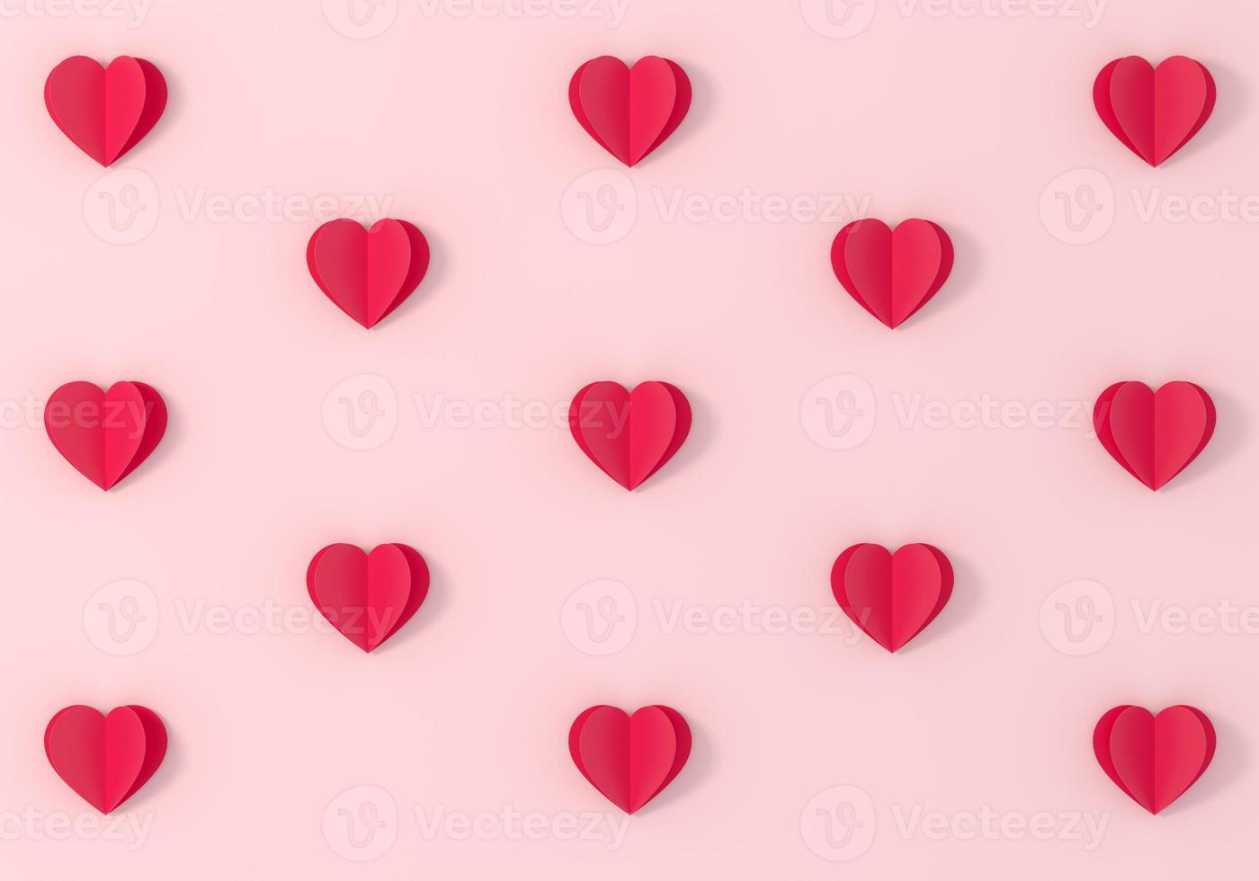 Origami red heart symbols on pink background. photo