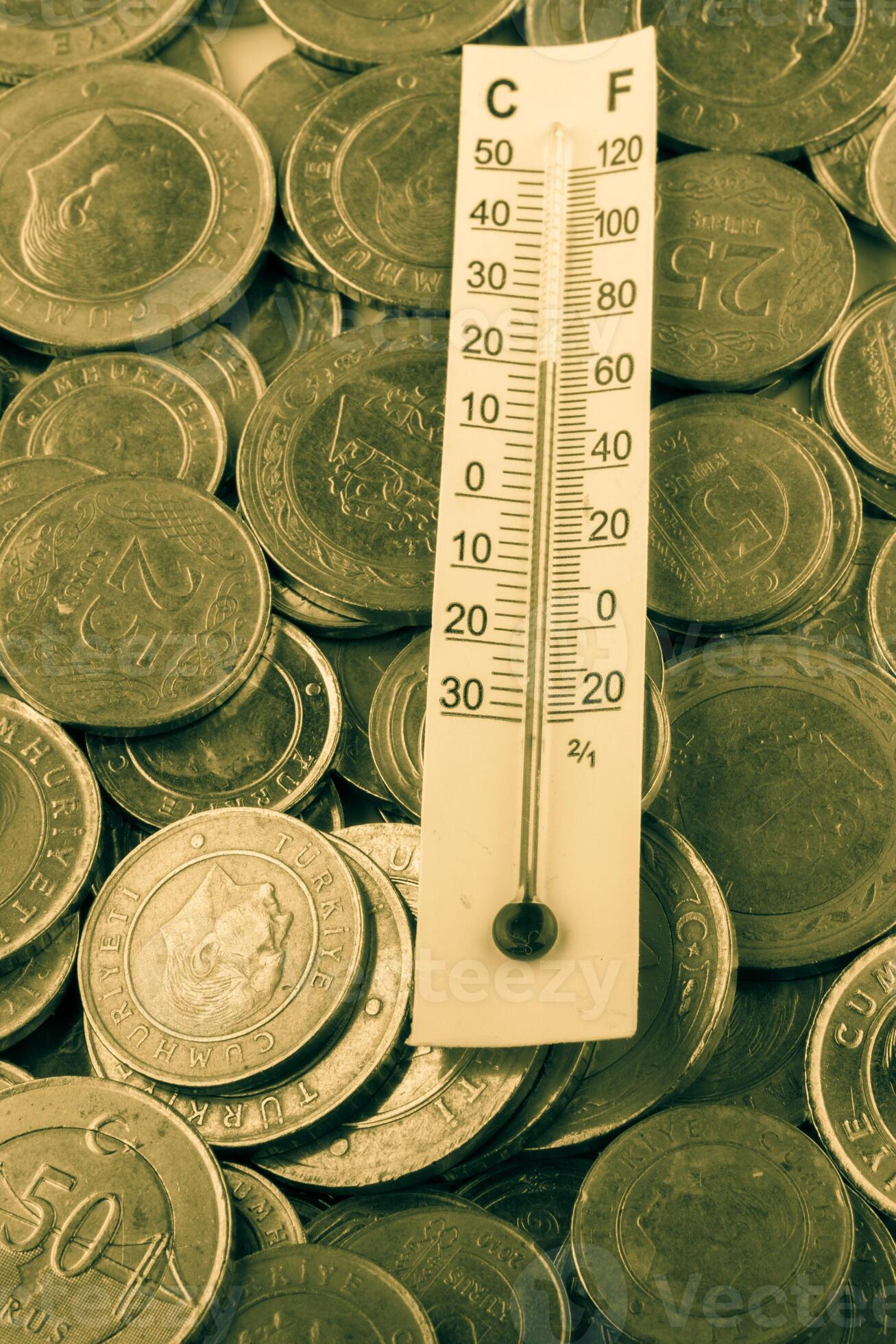 Thermometer and Turkish Lira coins 16792652 Stock Photo at Vecteezy