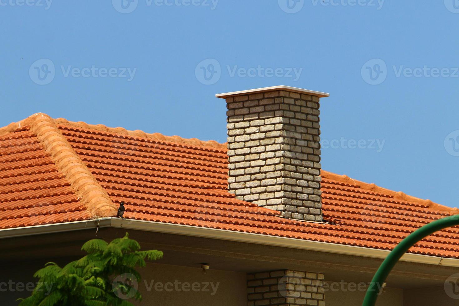 Tiled roof on a residential building in Israel. photo