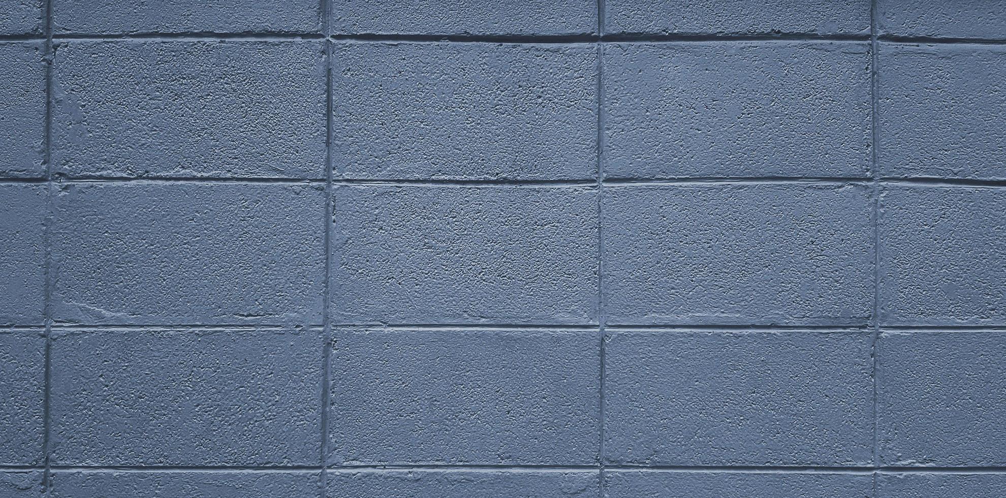 Gray or grey brick or block wall for background. Pastel and colorful painted of brickwork wallpaper. photo