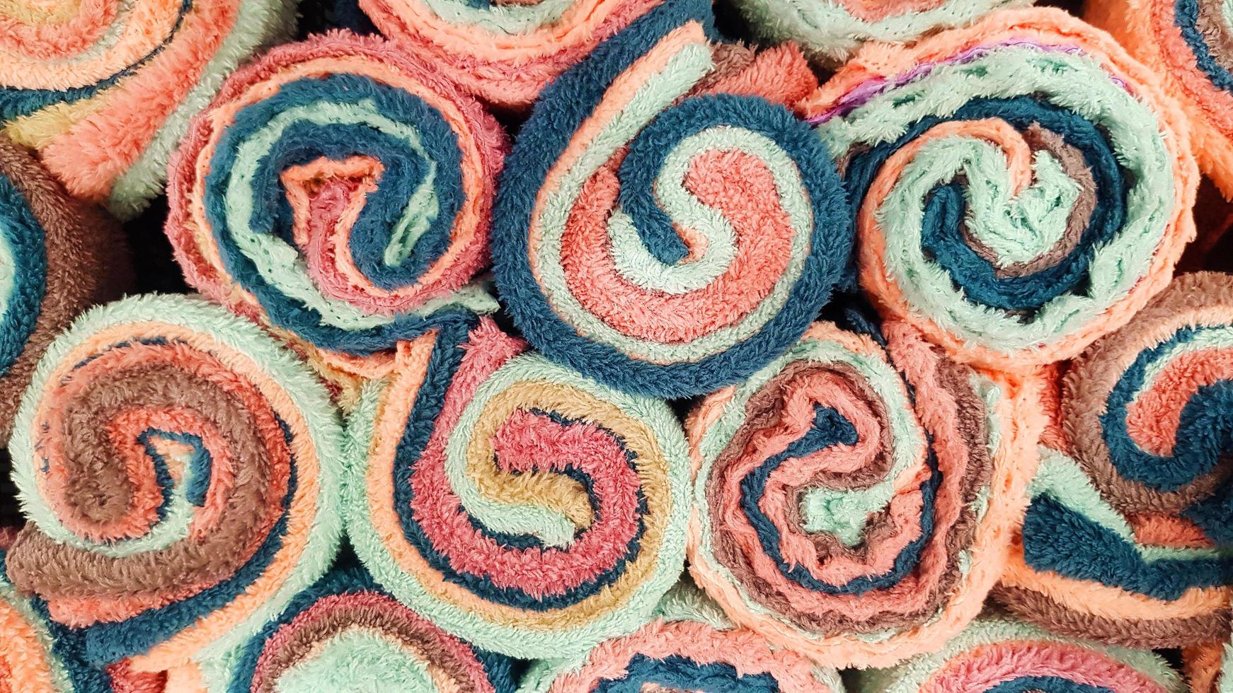 Top view of colorful towel or hand towels for background. Textured pattern of cotton or fabric wall. Art color wallpaper and Shape of object. photo
