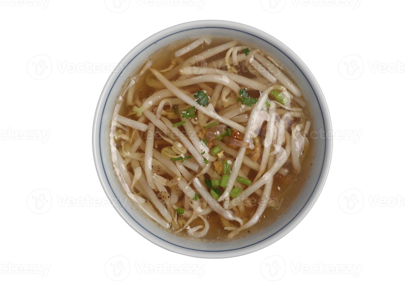 Clear bean sprout soup in white cup on white background photo