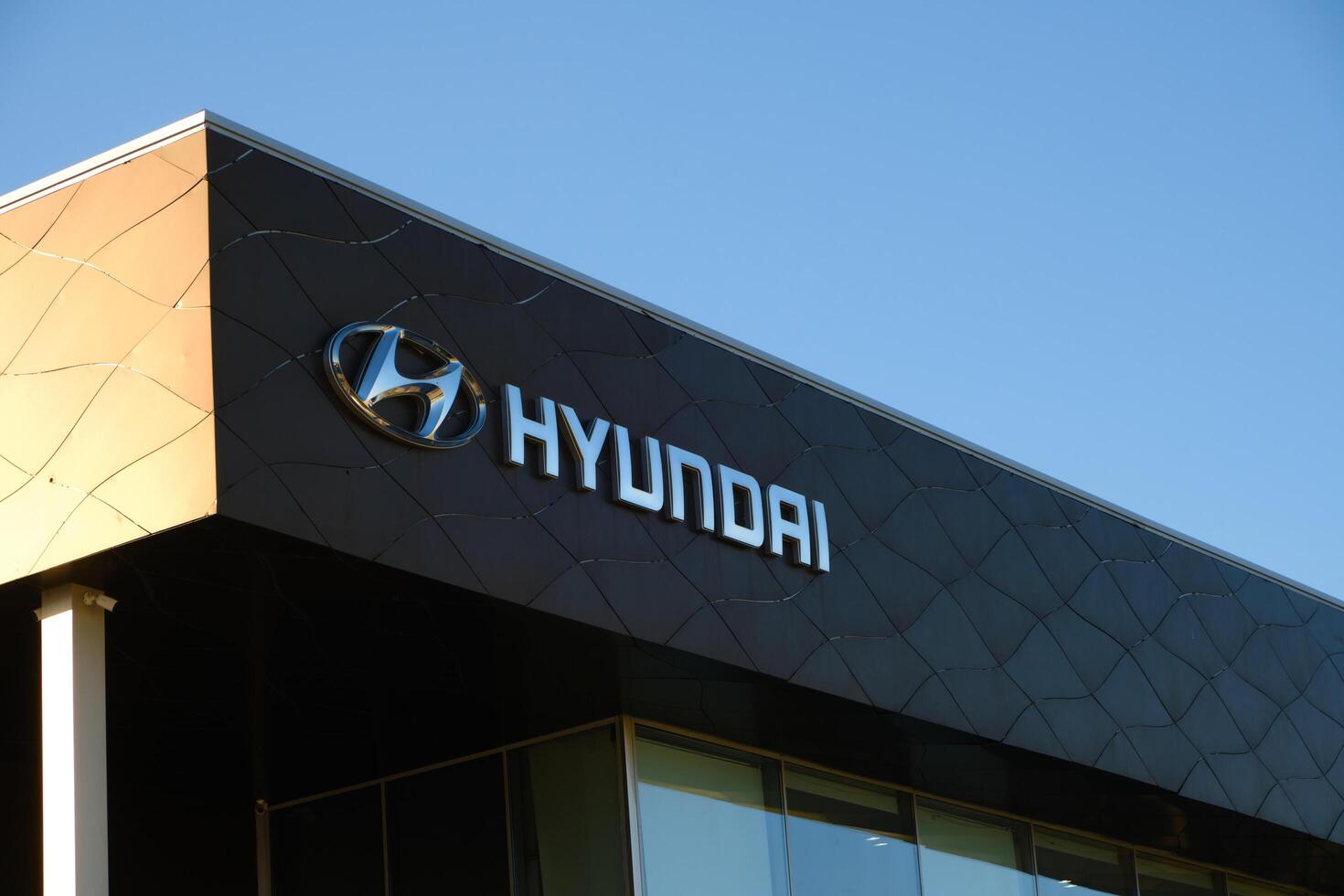 Kazakhstan, Kostanay, May 11, 2022, car dealership, logo on building  Hyundai dealership. 16800601 Stock Photo at Vecteezy