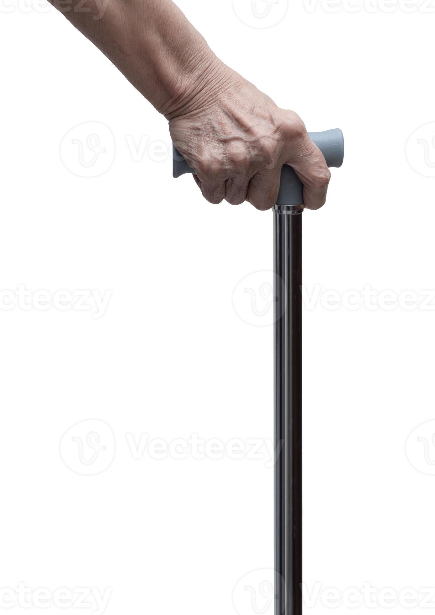 Senior hand holding a walking stick or a cane, isolated on white