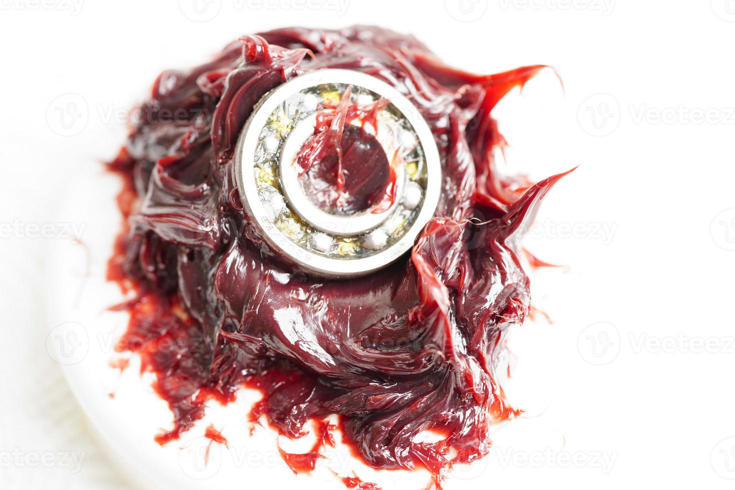 Grease and ball bearing, red excellent water resistance synthetic lithium complex grease for moving path and machinery lubrication for automotive and industrial. photo