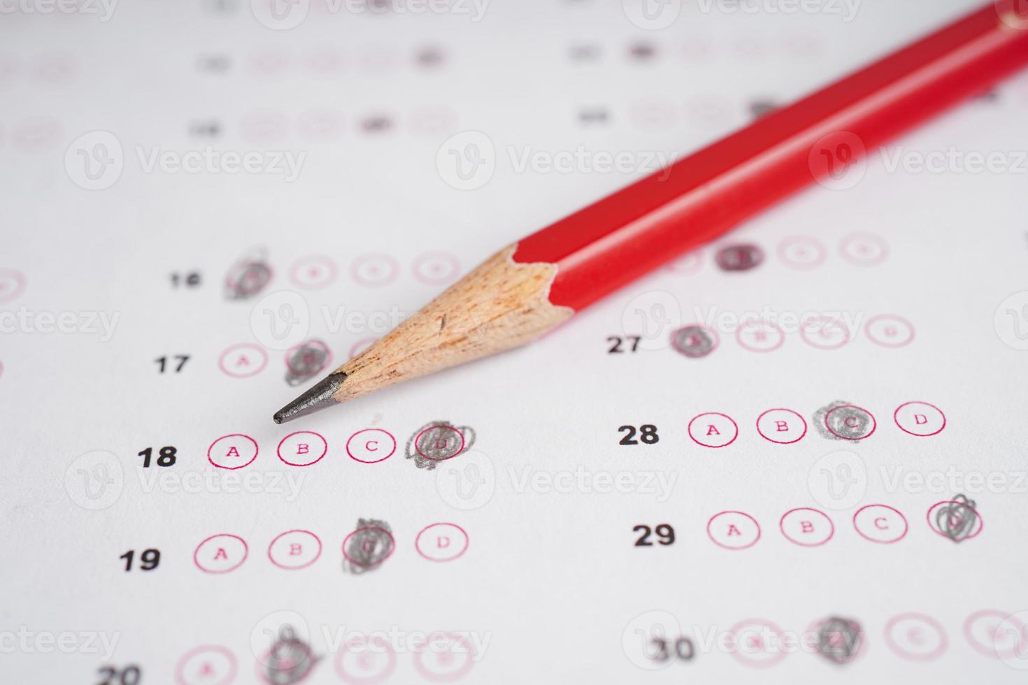 Answer sheets with pencil drawing fill to select choice, education concept. photo