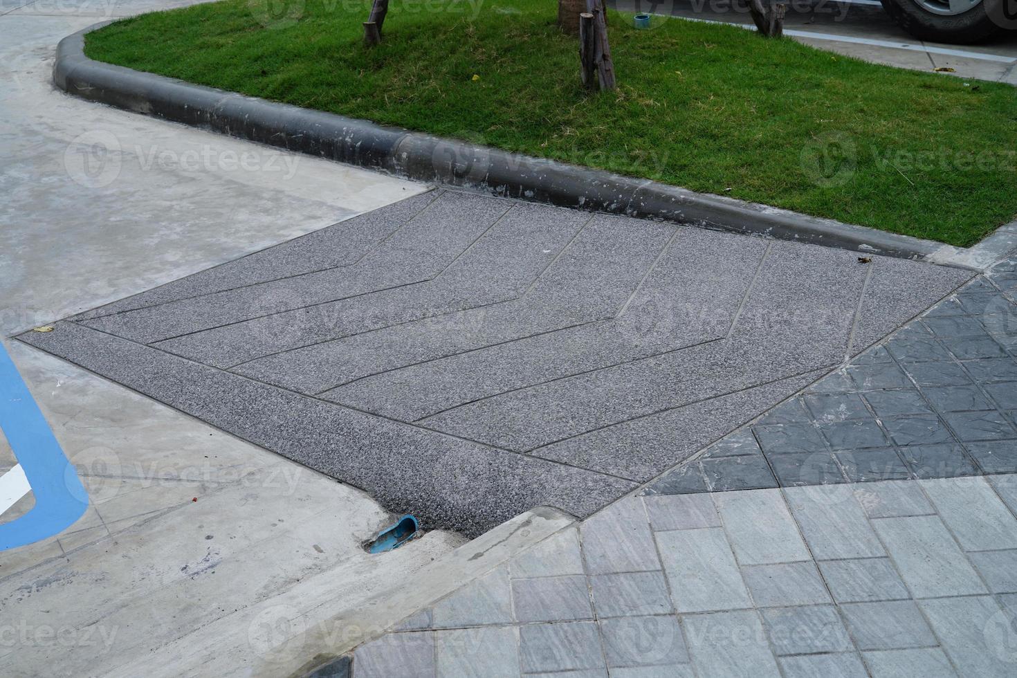 Building entrance trail with ramp for old or cannot self help disability person on wheelchair. photo