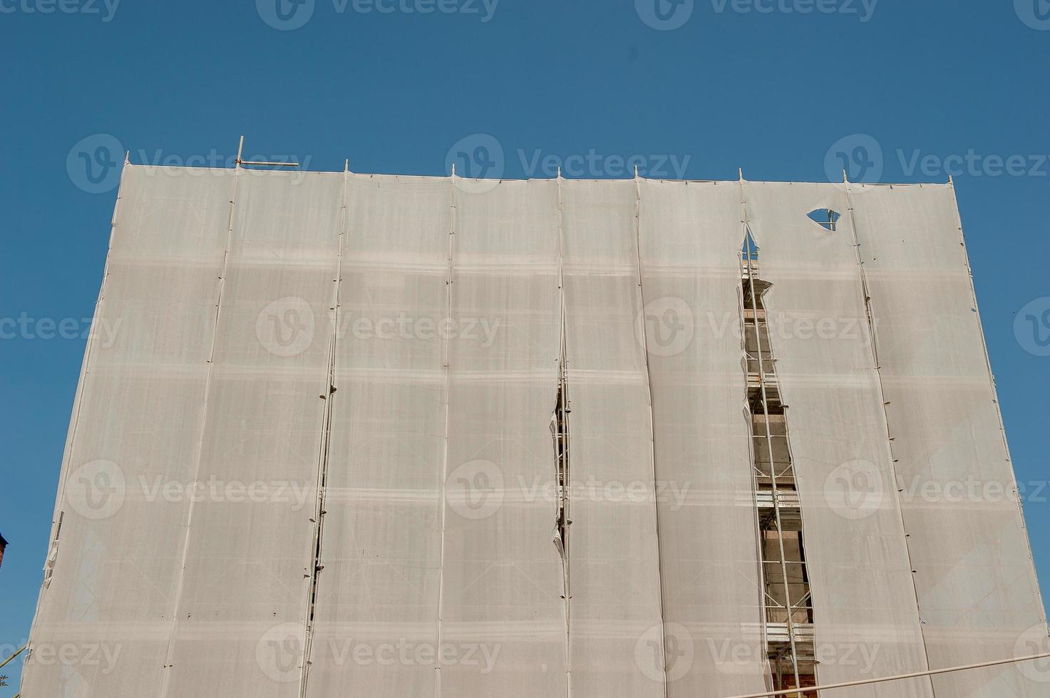Protective sheeting on scaffolding photo