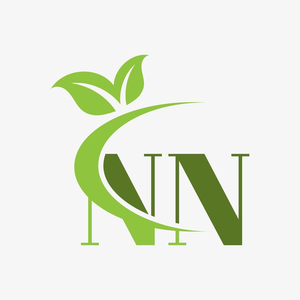 nn letter logo with swoosh leaves icon vector. vector