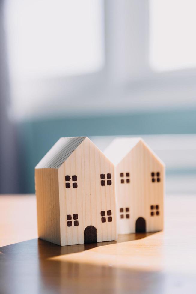 Signing home sales and insurance contracts with real estate agents, signing contracts to know the terms of buying and selling homes and real estate, contract signing ideas. photo
