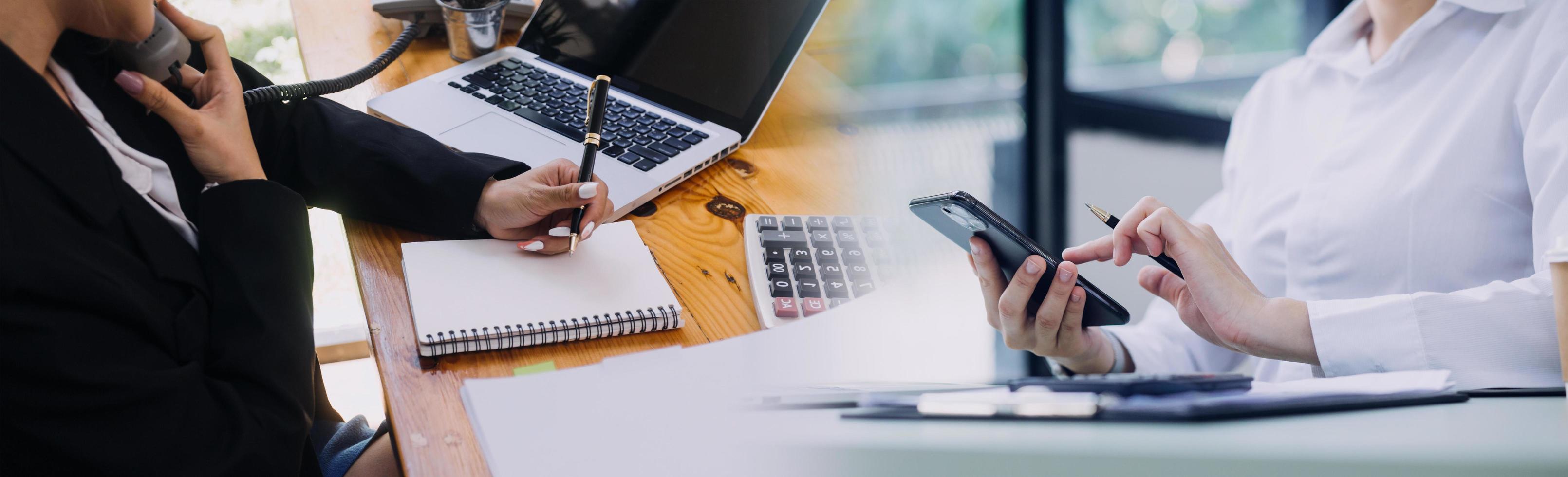 Businessman and team analyzing financial statement Finance task. with smart phone and laptop and tablet. Wealth management concept photo