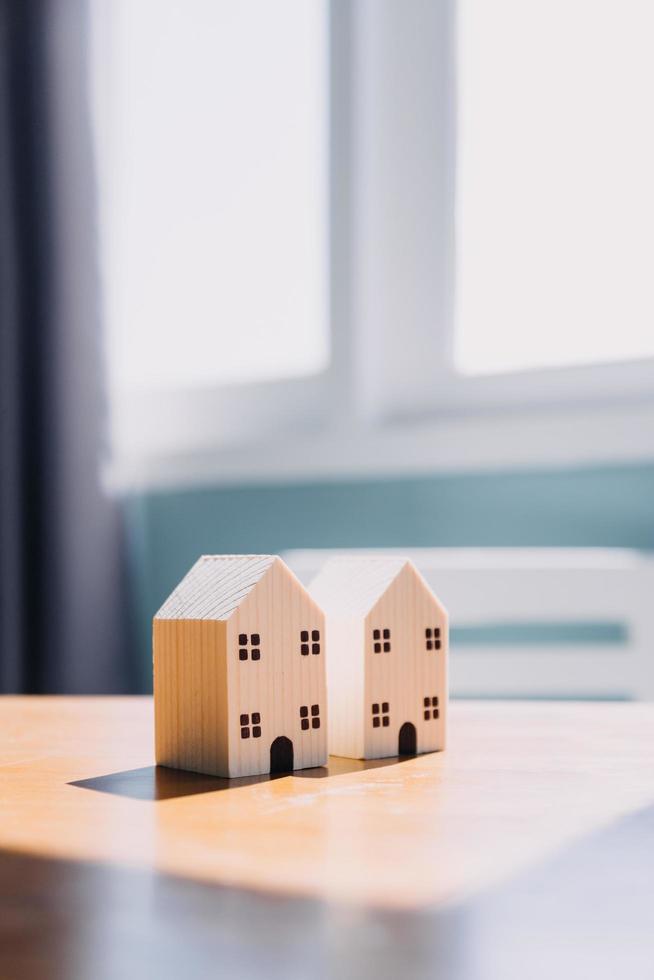 Signing home sales and insurance contracts with real estate agents, signing contracts to know the terms of buying and selling homes and real estate, contract signing ideas. photo