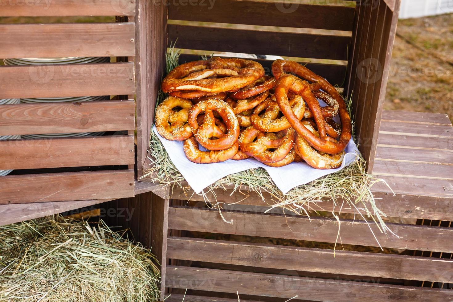 Delicious homemade pretzels in box top view photo