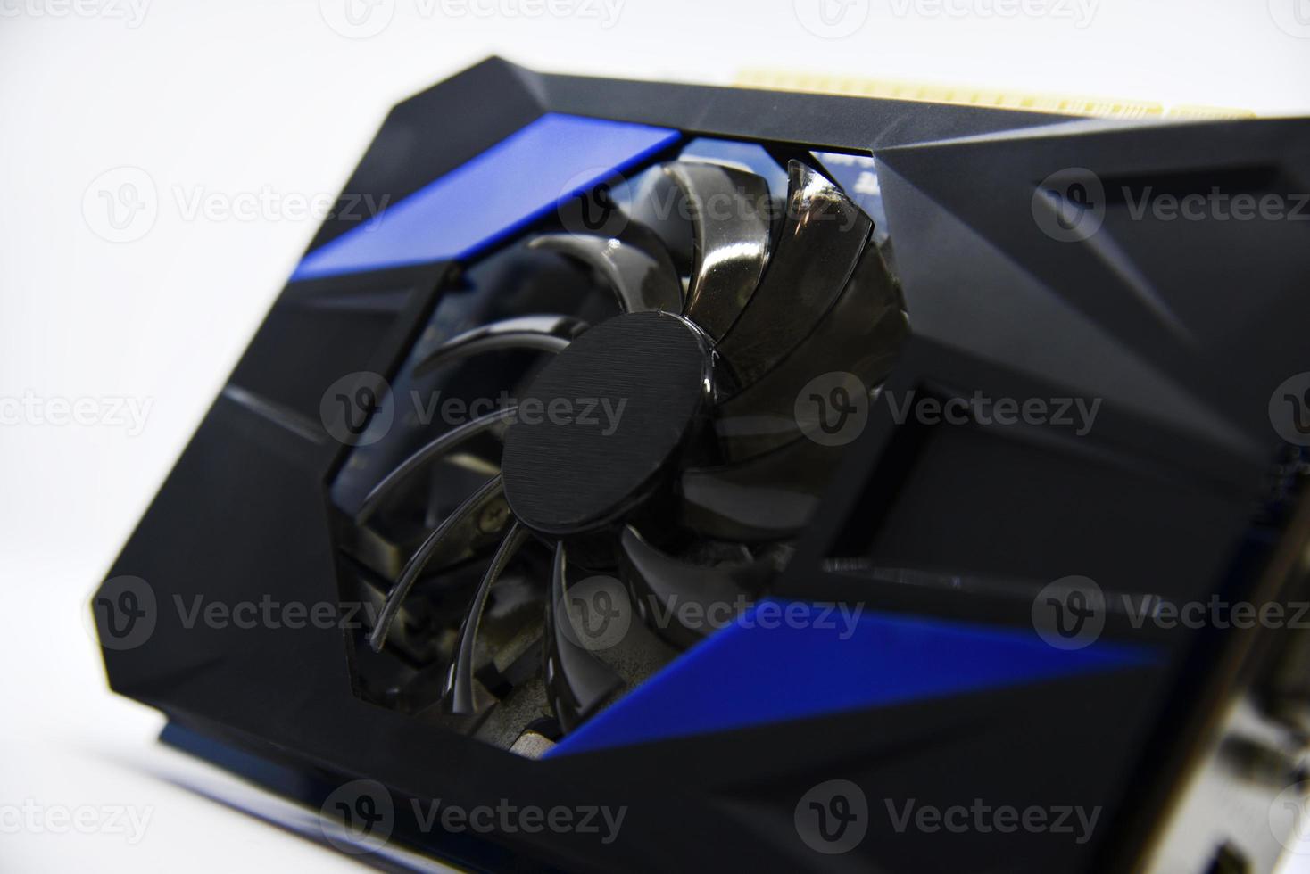 Blue graphics card with one fan on a white background. Accessories for computers. An electronic device. photo