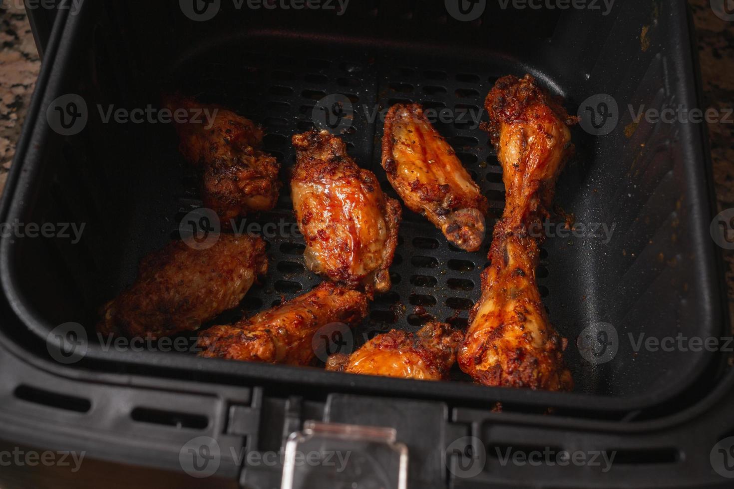 Air Fryer homemade grilled chicken wings. photo