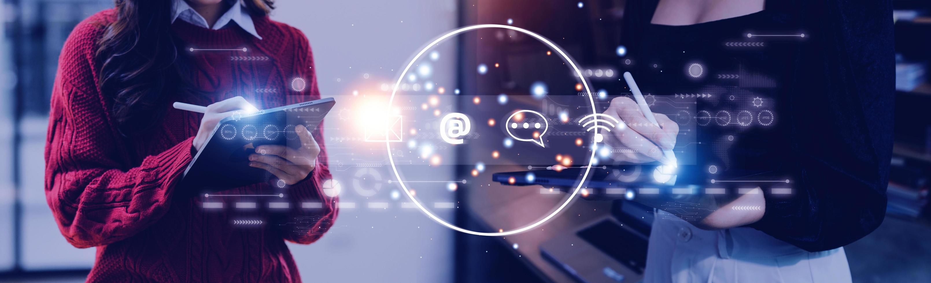 Contact us or Customer support hotline people connect. Businessman using a laptop and touching on virtual screen contact icons  email, address, live chat, internet wifi . photo