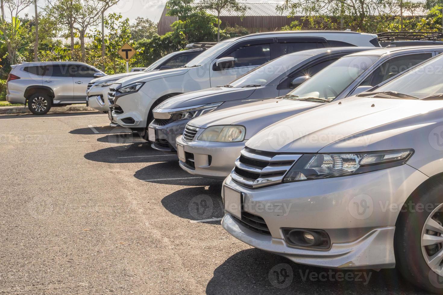 Cars parked in the outdoor parking lot photo