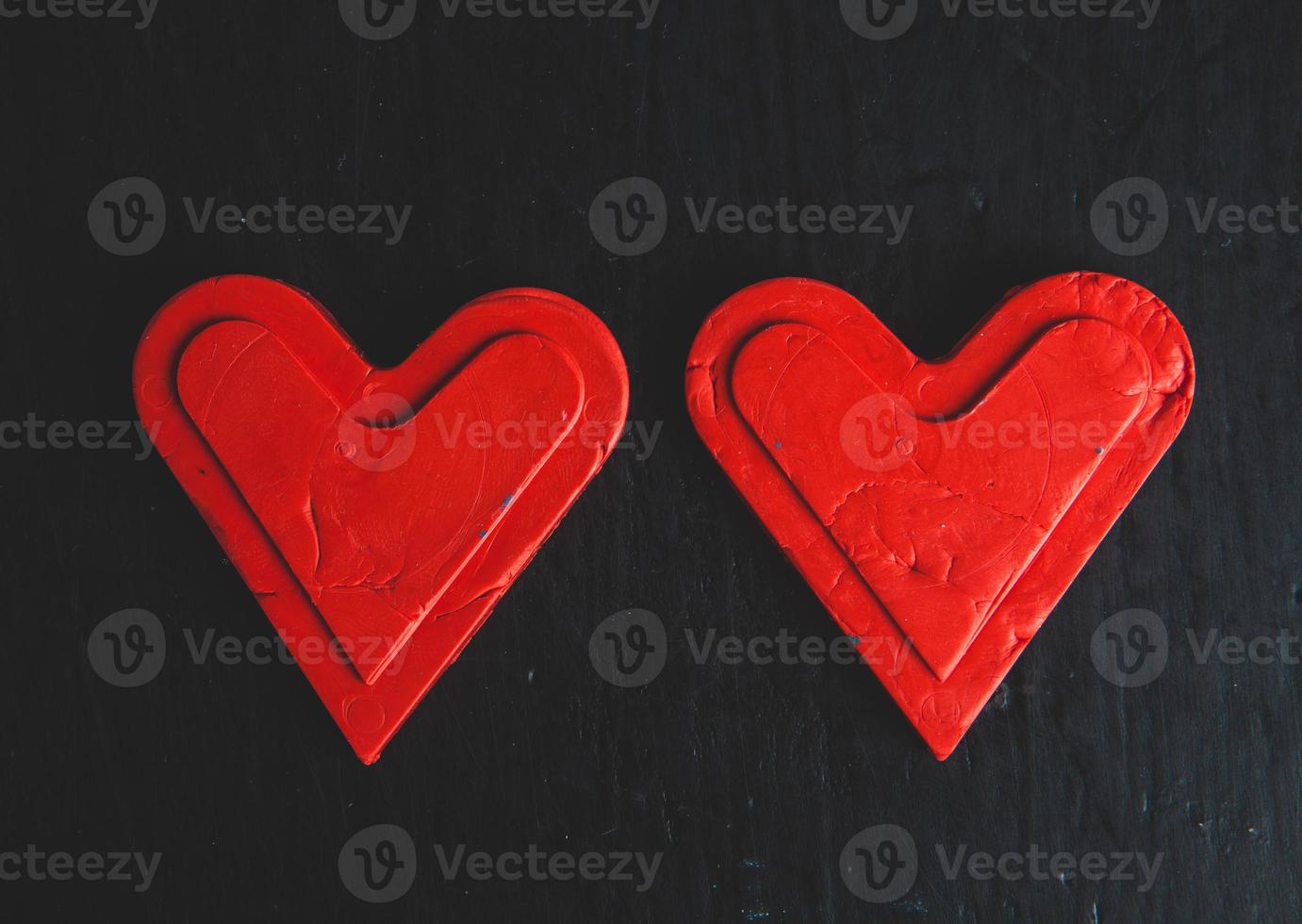 Love hearts on wooden texture background. Valentines day card concept. Heart for Valentines Day Background. photo