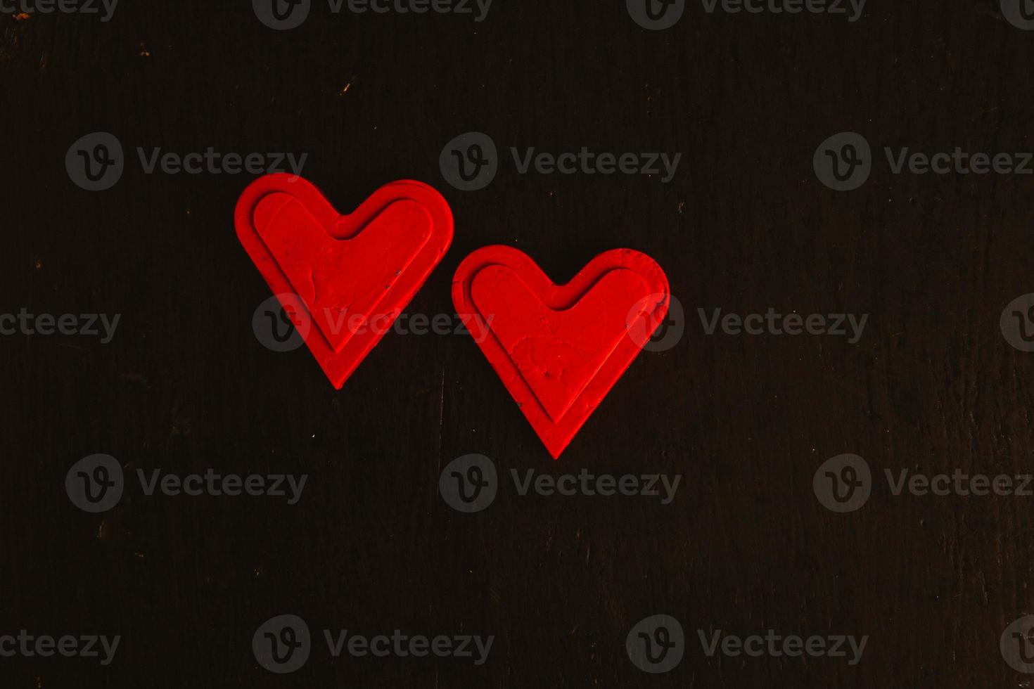 Love hearts on wooden texture background. Valentines day card concept. Heart for Valentines Day Background. photo