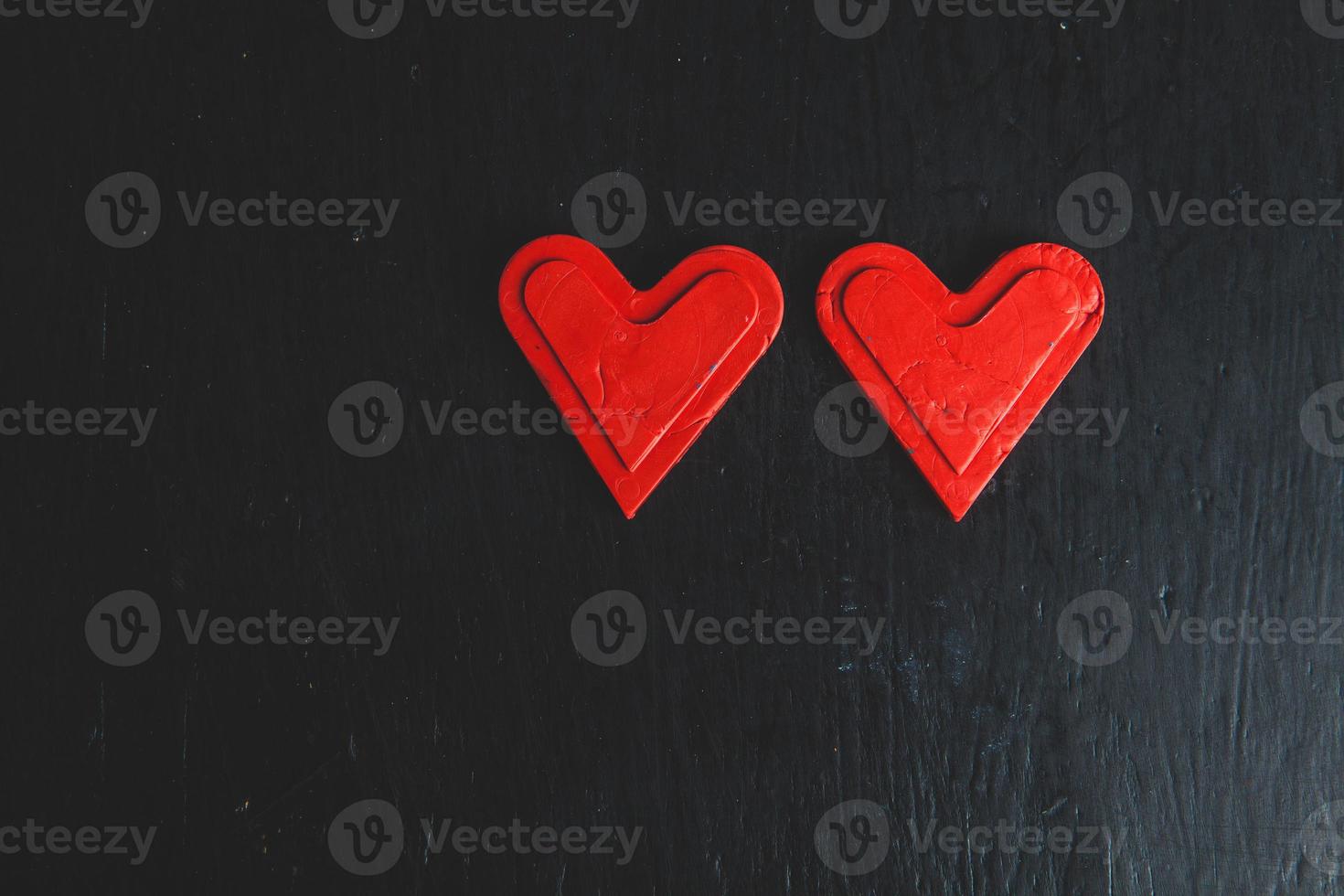 Love hearts on wooden texture background. Valentines day card concept. Heart for Valentines Day Background. photo