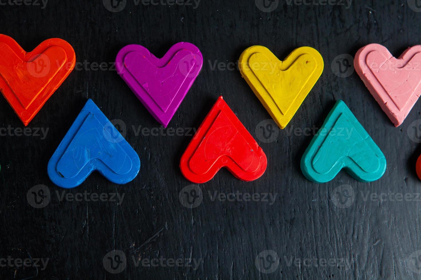 Love hearts on wooden texture background. Valentines day card concept. Heart for Valentines Day Background. photo