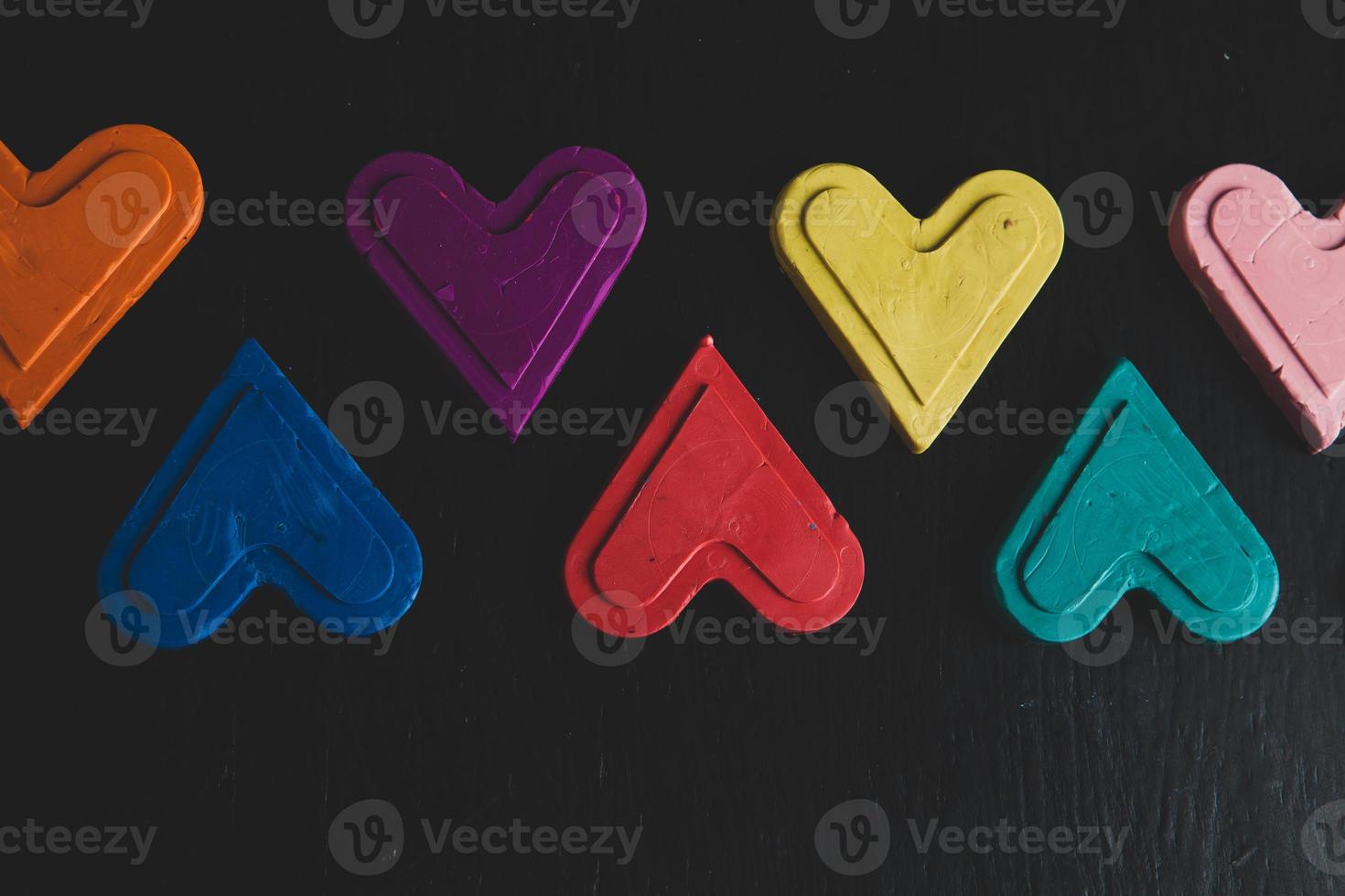 Love hearts on wooden texture background. Valentines day card concept. Heart for Valentines Day Background. photo