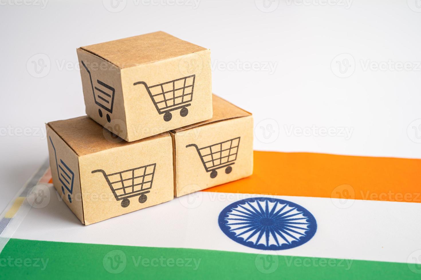 Box with shopping cart logo and India flag, Import Export Shopping online or eCommerce finance delivery service store product shipping, trade, supplier concept. photo